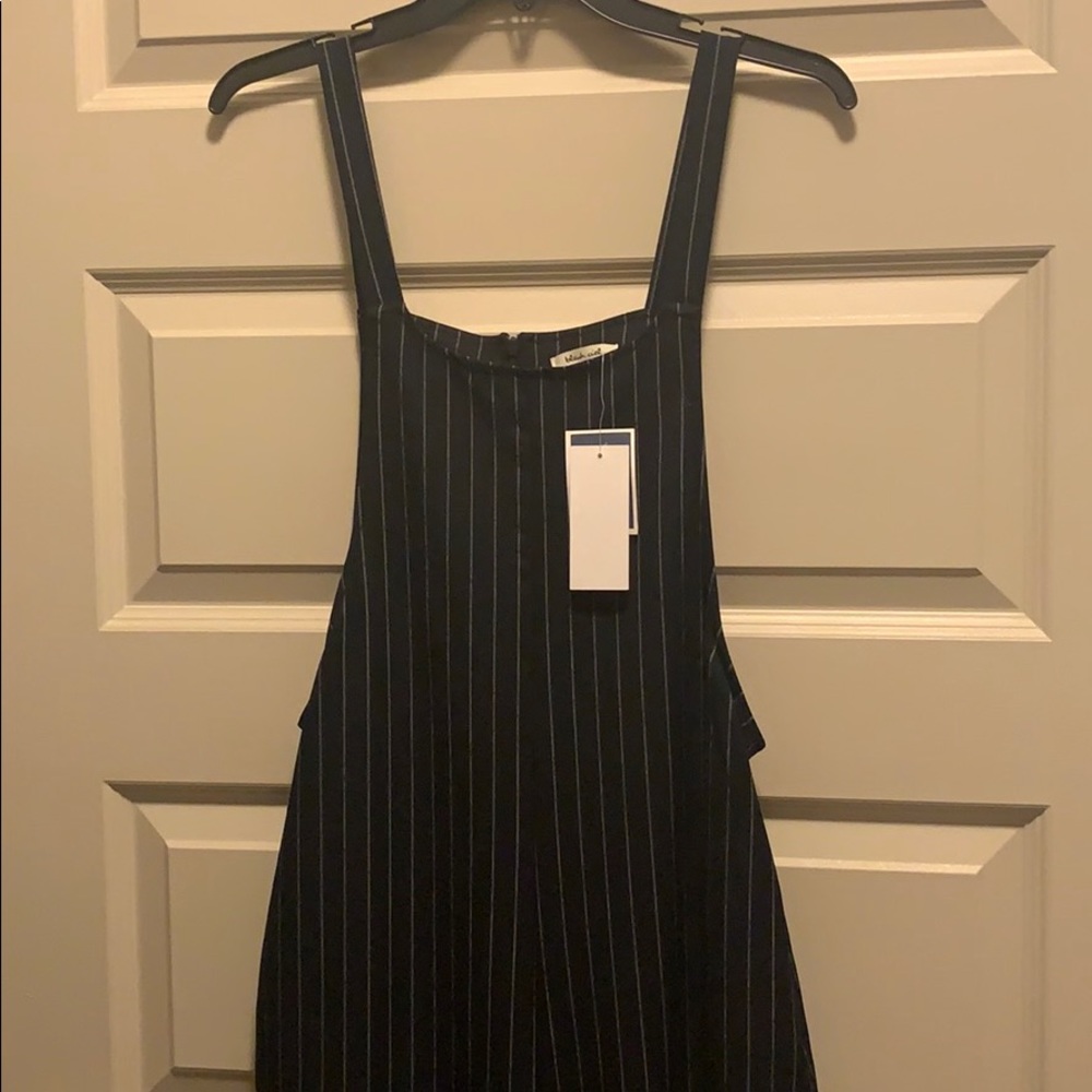 Navy and white jumpsuit